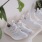 shoes on rack in living room