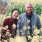 older couple smiling in field